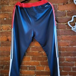 Adidas track pants. Smoke free home. Dry cleaned only.